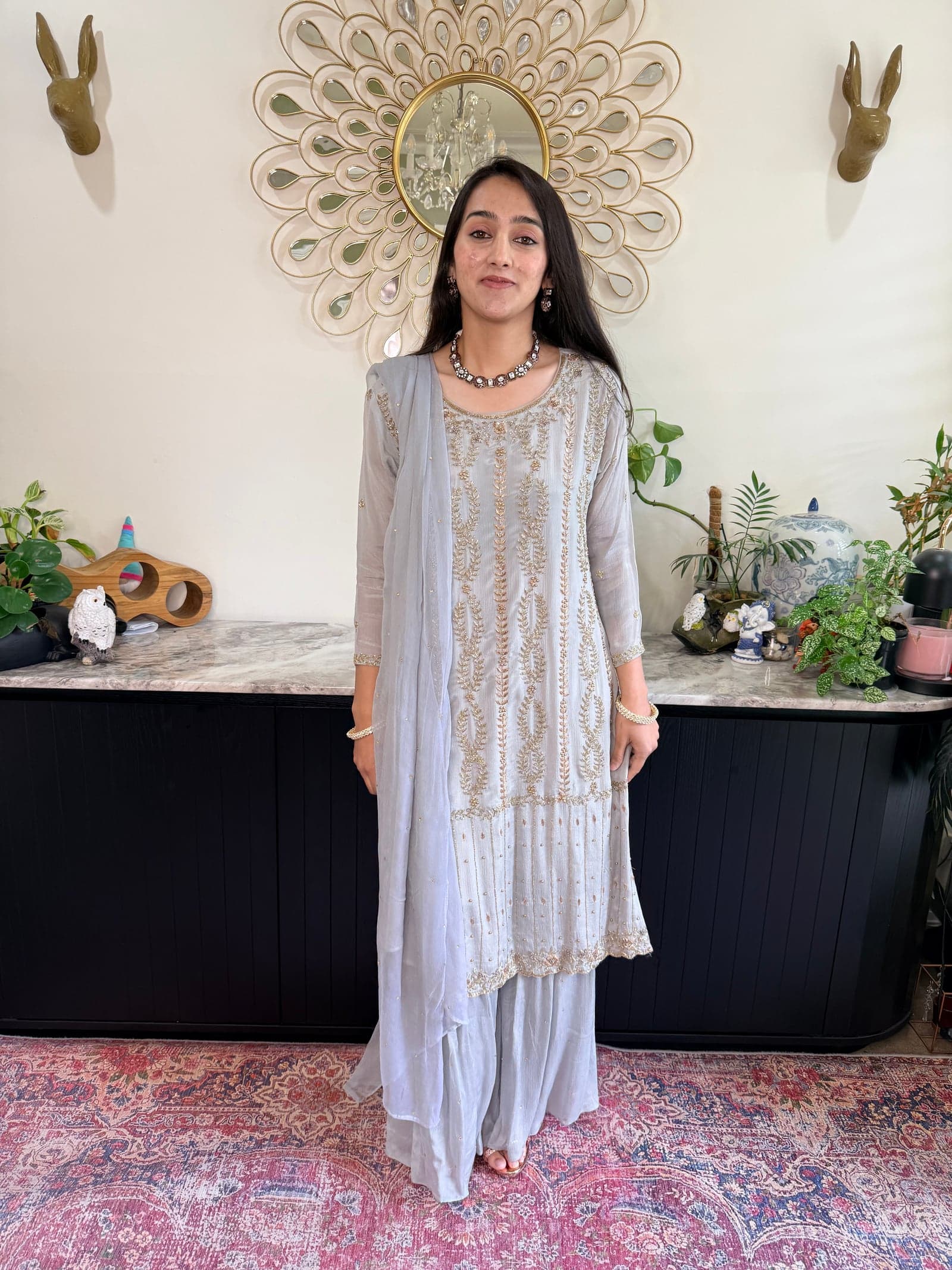 Aqua blue embroidered gharara set with dupatta — editorial reference
