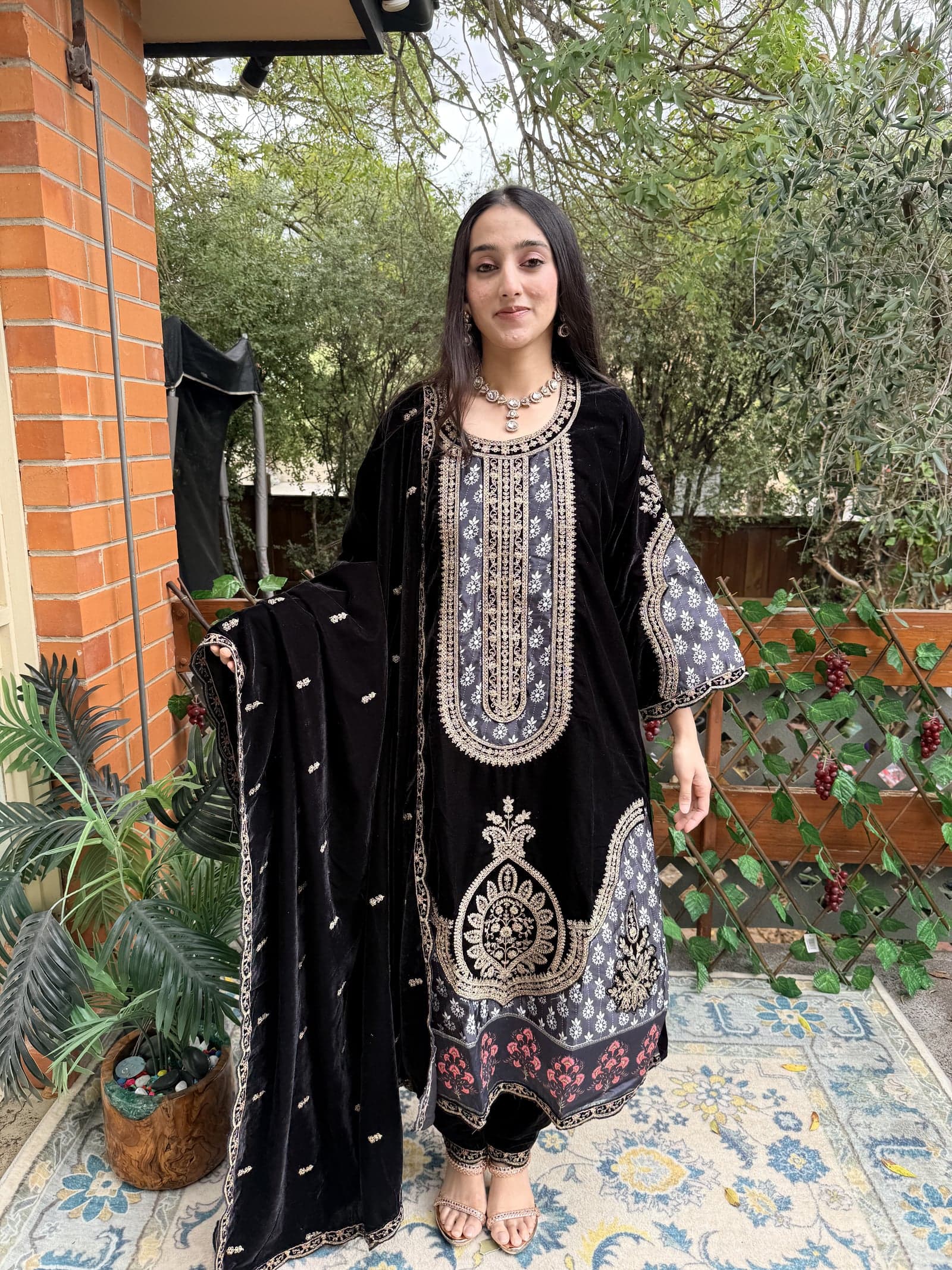 Zardozi reference — black velvet salwar suit with gold metallic embroidery