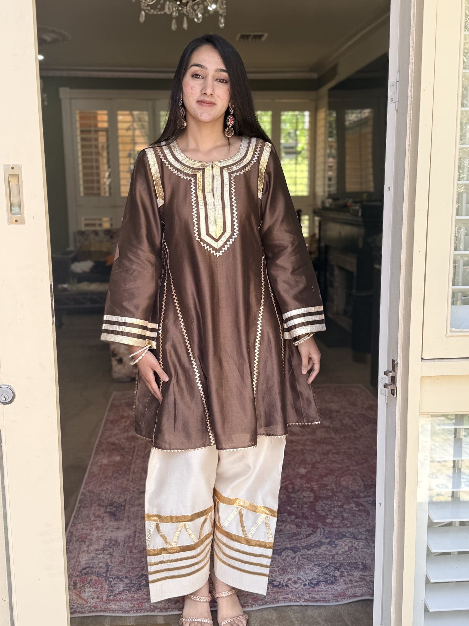 Brown and ivory chikankari-and-gota anarkali kurta on white muslin